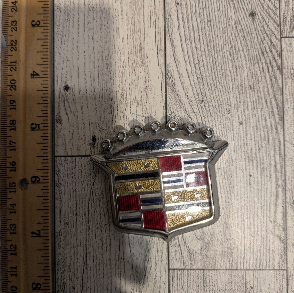Cadillac Emblem with Red and Gold Accents